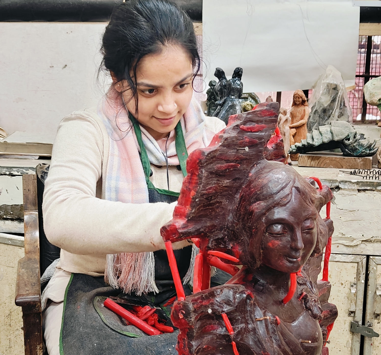 Bulbul Chauhan working on a sculpture in the studio
